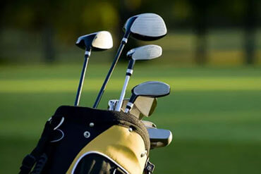 close-up of golf bag and clubs